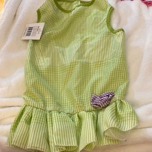 New very cute green plaid dress with a purple flower, purple and white flower